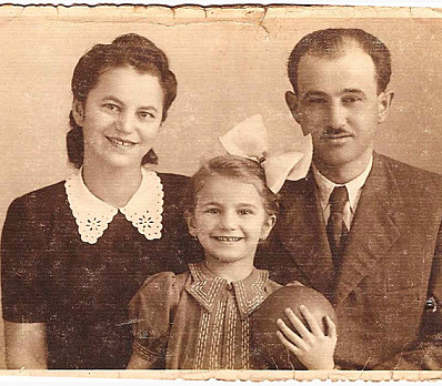 Family portrait, girl with ball.
