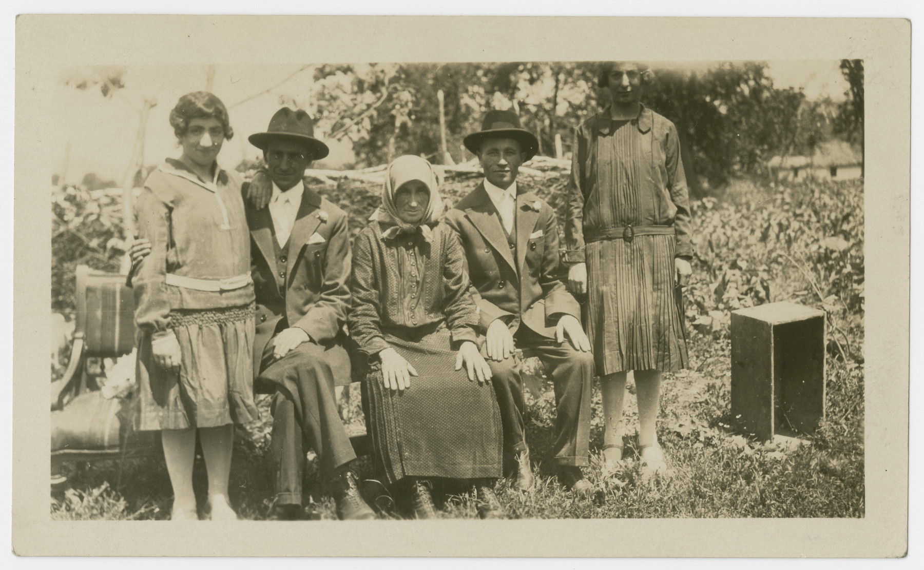 Family posing for an outdoor portrait, 1928