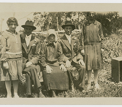 Family posing for an outdoor portrait, 1928