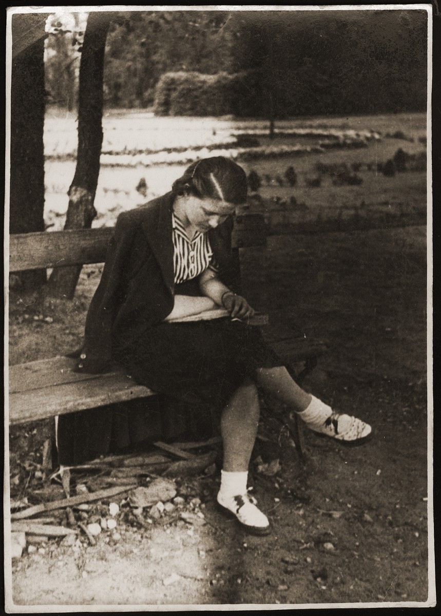 A young Jewish woman sitting on a bench in Brest 1937-1938