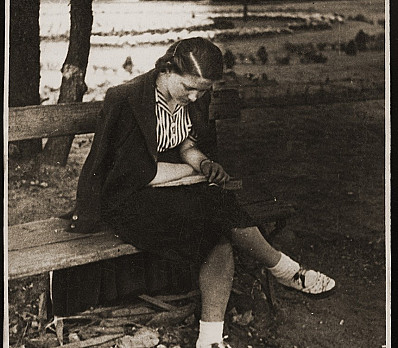 A young Jewish woman sitting on a bench in Brest 1937-1938
