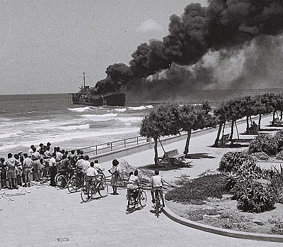 Altalena on fire after being shelled near Tel Aviv